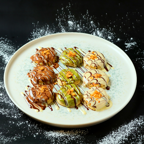 Fluffy pancakes with toppings at TedzCafe